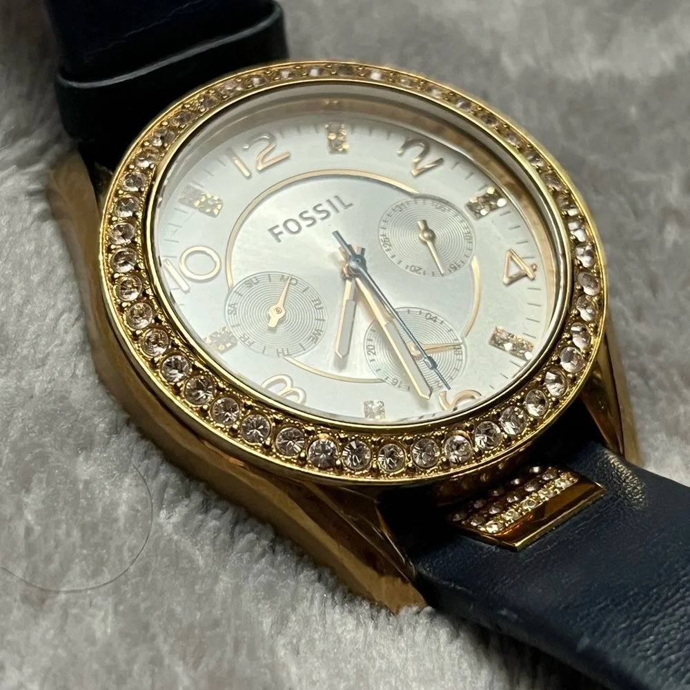 Fossil Watch Collection with Gold, Silver, and Black Accents - Picture 4 of 5